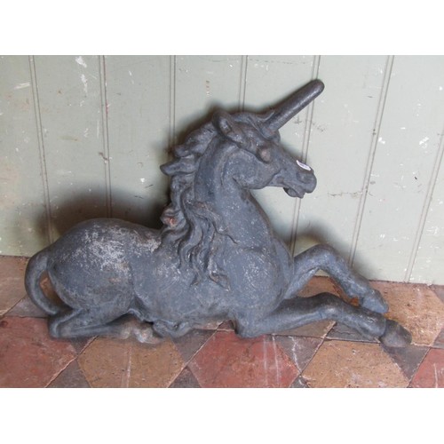 1052 - A pair of Country House cast iron lion and unicorn door porters, the unicorn 41 cm high x 60 cm, the... 