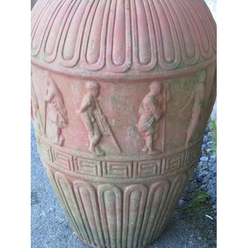 1054 - A weathered terracotta oviform vase in the Grecian/Roman style with processional and moulded detail,... 