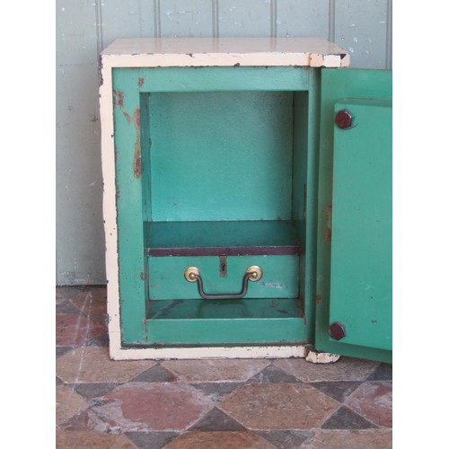 1055 - A small antique safe with T bar handle and later painted finish (complete with key), 46 cm high x 35... 