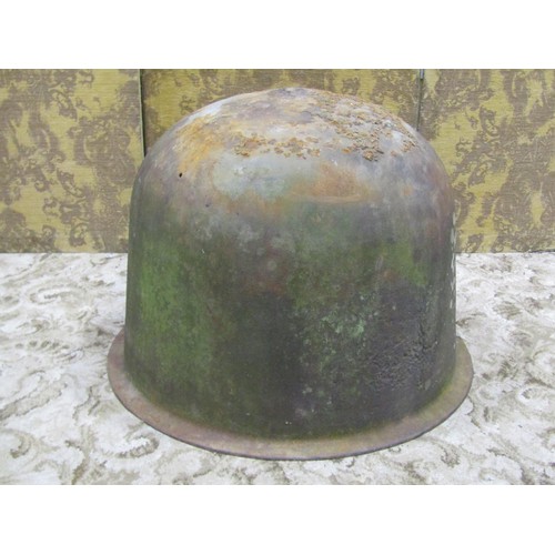 1088 - A large antique cast iron cauldron with flared rim and rounded bottom, 53 cm high x 75 cm diameter