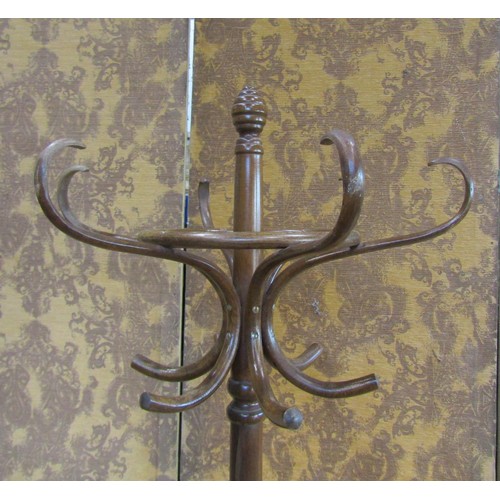 1129 - A vintage Bentwood floorstanding coat and hat  stand with beehive finial, 194 cm high