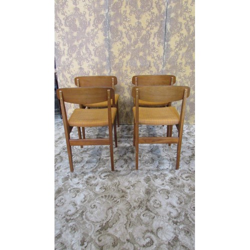 1136 - A set of four retro teak dining chairs, with curved splats and original upholstered seats