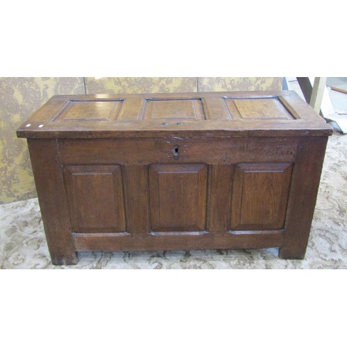 1145 - An 18th century oak coffer with hinged lid and rectangular fielded panels 68 cm high x 125 cm x 54 c... 