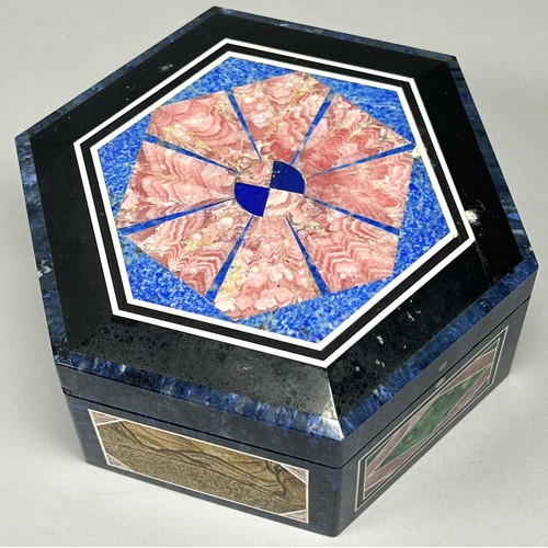 411 - A contemporary Pietra Dura jewel box of hexagonal outline, 10 cm diameter