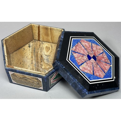 411 - A contemporary Pietra Dura jewel box of hexagonal outline, 10 cm diameter