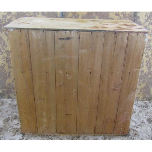 1174 - An old  stripped pine kitchen unit, floorstanding with deep frieze drawer over an open compartment w... 