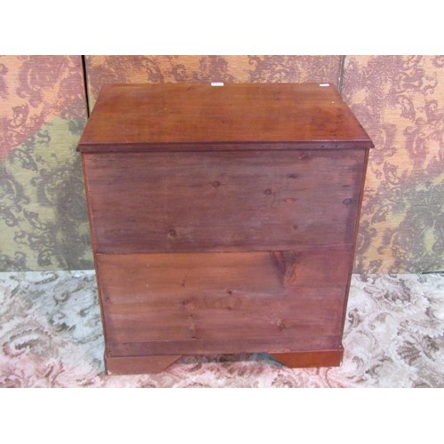 1163 - A small Georgian style mahogany chest of drawers of four long graduated drawers set on bracket feet,... 