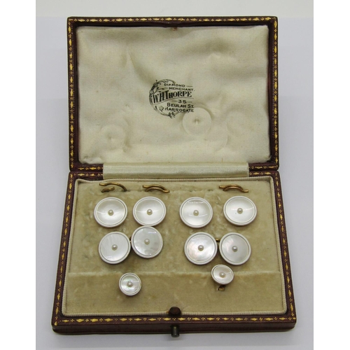 360 - Early 20th century 18ct mother-of-pearl and white enamel dress jewellery set, comprising pair of cuf... 