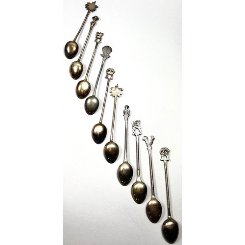 240 - Ten novelty silver metal teaspoons, boxed 2.7oz