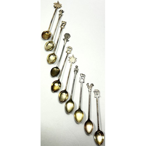 240 - Ten novelty silver metal teaspoons, boxed 2.7oz