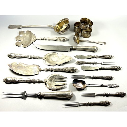 278 - A canteen of unusual elaborately decorated cutlery and selection of unusual serving utensils , knife... 