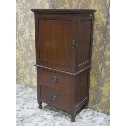 1262 - An Edwardian mahogany filing cabinet, freestanding and partially enclosed by a panelled door, reveal... 