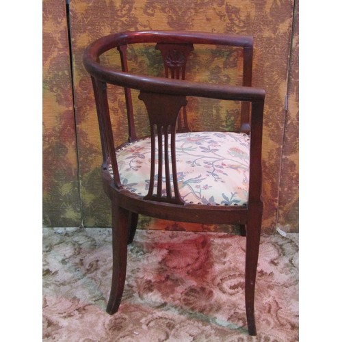 1265 - An Edwardian mahogany light weight tub chair, the horseshoe shaped back with pierced splats and upho... 