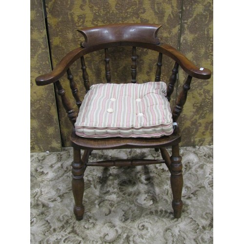 1281 - A late 19th century smokers bow elbow chair with turned spindle back