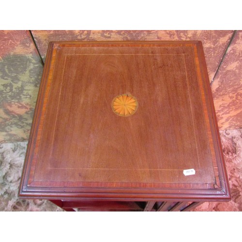 1283 - An inlaid Edwardian mahogany floorstanding revolving bookcase of square cut form, 87cm high x 45cm s... 