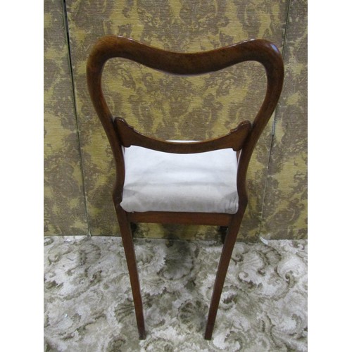 1299 - Set of four Victorian mahogany dining chairs with kidney shaped backs over drop in seats, together w... 