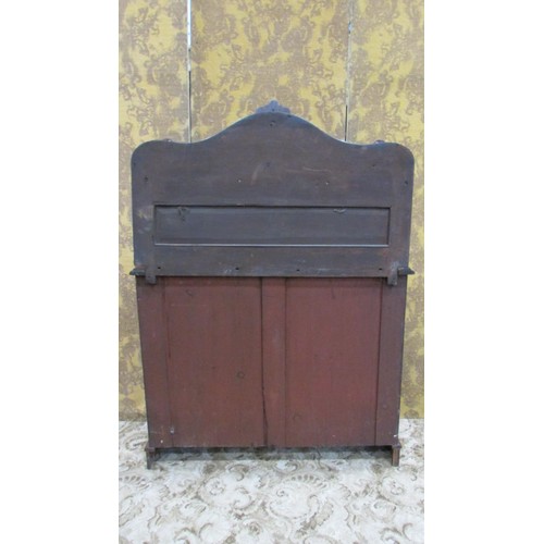 1324 - A Victorian mahogany chiffonier with raised arched and scrolled panelled back over a frieze drawer a... 