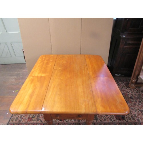 1327 - A large Victorian satin birch Pembroke table on turned supports 75H x 116L x 50W (when closed), 100W... 