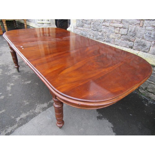 1344 - A large late Victorian D-end pull out extending dining table with single additional leaf, raised on ... 