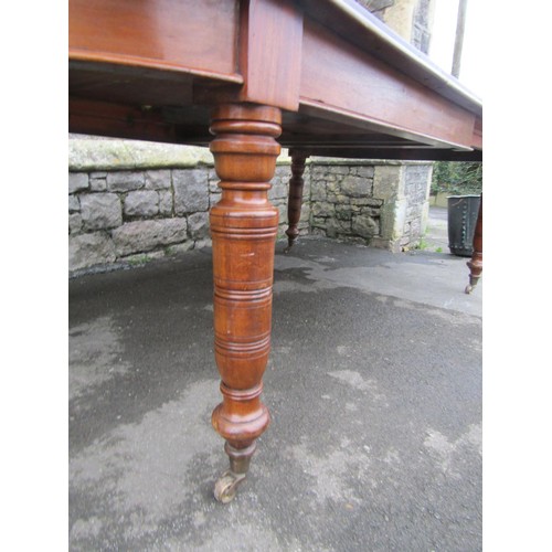 1344 - A large late Victorian D-end pull out extending dining table with single additional leaf, raised on ... 