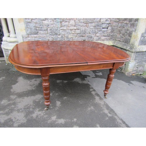 1344 - A large late Victorian D-end pull out extending dining table with single additional leaf, raised on ... 