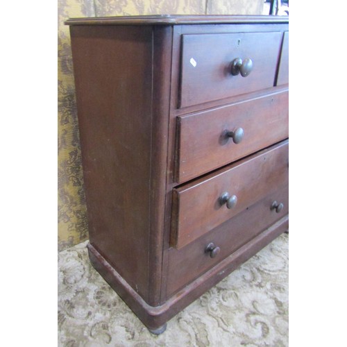 1228 - A Victorian mahogany bedroom chest of three long and two short drawers with moulded outline, 115 cm ... 