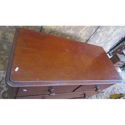 1228 - A Victorian mahogany bedroom chest of three long and two short drawers with moulded outline, 115 cm ... 