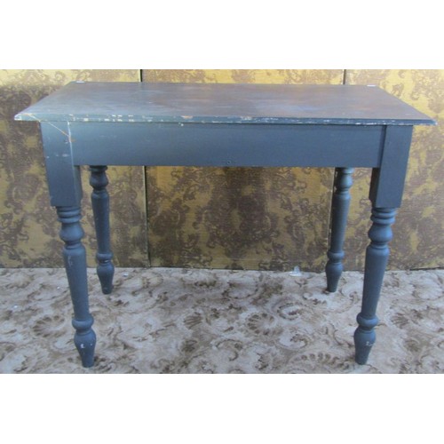 1241 - A Victorian style pine side table fitted with two shallow frieze drawers raised on turned tapered su... 