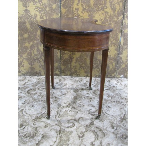 1251 - An inlaid Edwardian mahogany kidney shaped side table with frieze drawer raised on square tapered le... 