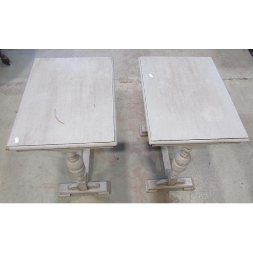 1254 - A pair of oak occasional tables with later painted finish, the rectangular tops raised on turned sup... 