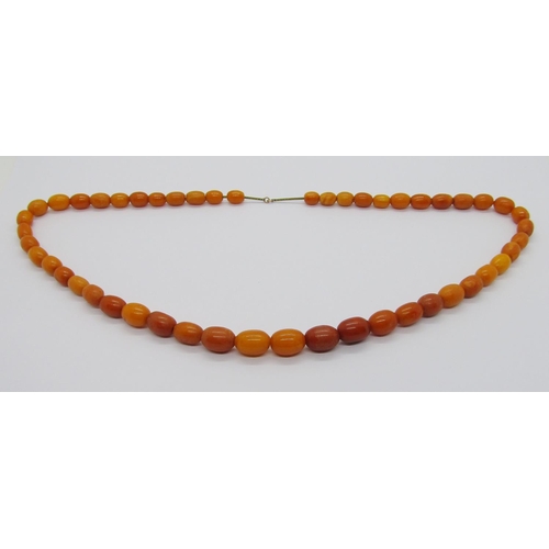 366 - Amber coloured bead necklace strung on a gilt metal foxtail chain, 25g