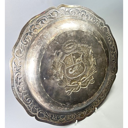 247 - A Peruvian embossed silver salver, stamped 900, Peruana, 33cm diam, 18.9 oz