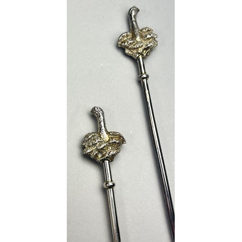 250 - A Pair of Patrick Marvos silver twizzle sticks with swirling grouse to the heads, hallmarks 925, W 2... 