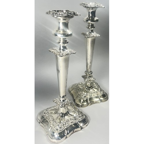 252A - A Pair of silver plated  Georgian style candlesticks with removable sconces 34.5cm high.