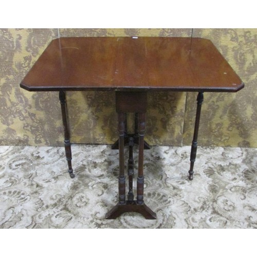 1151 - An Edwardian mahogany drop-leaf Sutherland type tea table raised on slender turned and splayed mould... 