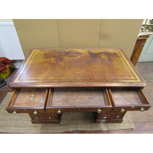 1396 - A 19th century mahogany pedestal desk, one side enclosing eleven graduated drawers, the far side wit... 