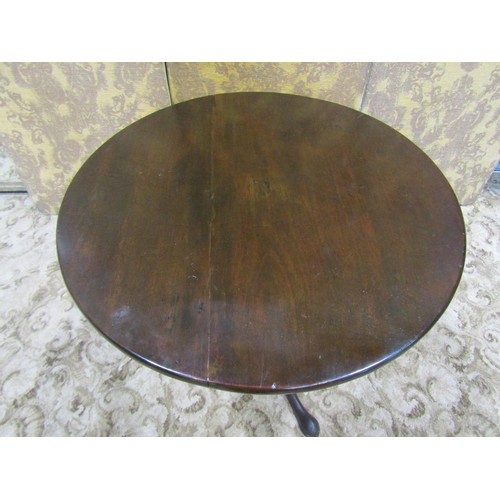 1403 - A Georgian snap top table on turned column and tripod, 79cm diameter