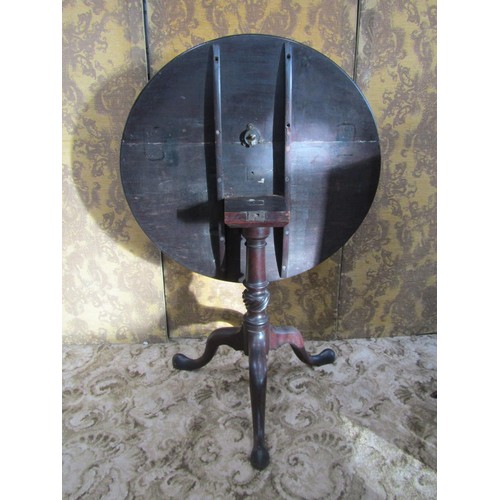 1403 - A Georgian snap top table on turned column and tripod, 79cm diameter