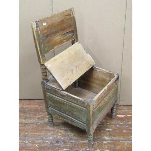 1404 - A rustic pine box chair, with bobbin supports, steel banded repairs and traces of original paint