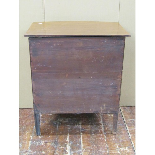 1407 - A mahogany bow front commode on swept supports