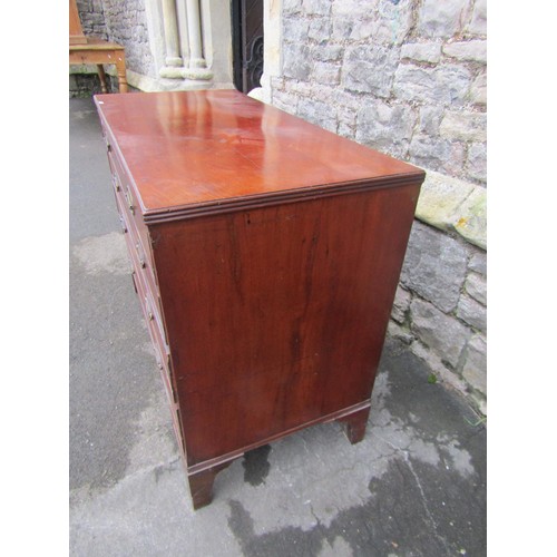 1420 - An early 19th century mahogany chest of four long graduated drawers on bracket supports, 81cm high x... 