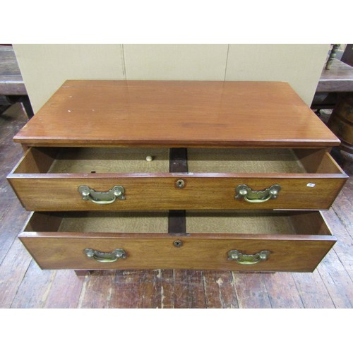 1422 - A large Georgian oak chest of three long graduated drawers, fitted with three pairs of heavy gauge b... 