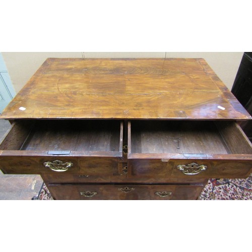 1423 - An 18th century walnut chest on stand, the chest with three long and two short graduated drawers, th... 