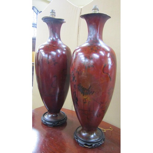 1425 - Pair of baluster shaped lacquered vases adapted as lamps, with restoration, 65cm high