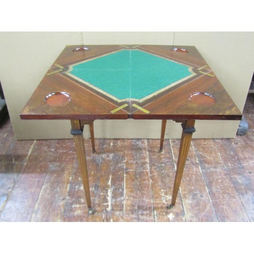 1430 - An Edwardian rosewood envelope top card table of usual form with inlaid detail, frieze drawer and sq... 