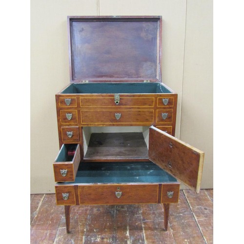 1434 - A pretty Georgian mahogany commode with rising lid over a central cupboard and single long frieze dr... 