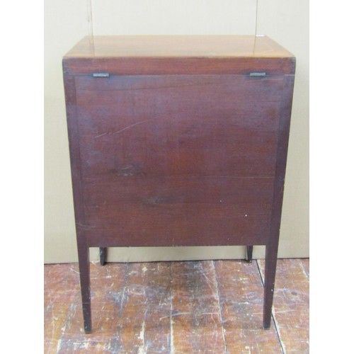 1434 - A pretty Georgian mahogany commode with rising lid over a central cupboard and single long frieze dr... 