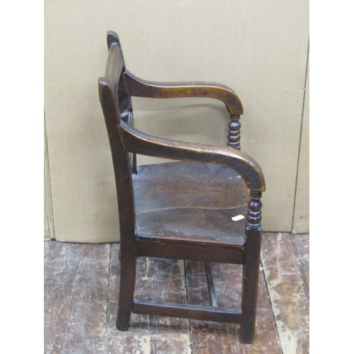 1440 - A regency countrymade child's elbow chair in mixed woods, elm and beechwood, 53cm high x 35cm wide x... 