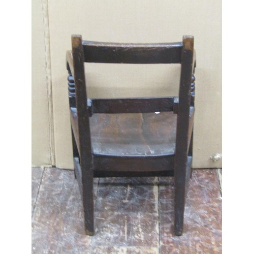 1440 - A regency countrymade child's elbow chair in mixed woods, elm and beechwood, 53cm high x 35cm wide x... 