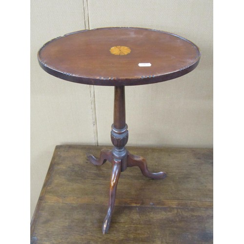 1450 - A Georgian mahogany fold over top card table of rectangular form, the circular baize lined interior ... 